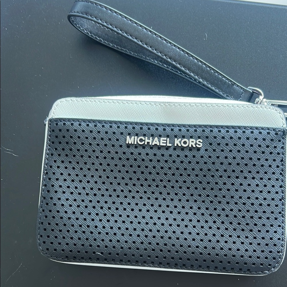 Michael Kors Perforated Black and White Wristlet